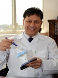Dr.  Ayman Massri