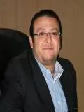 Dr.  Maged Al Adrousy