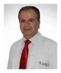 Dr.  Roger Batrouni
